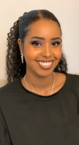 Natural prom glam makeup with glowing skin and soft curls, styled by Waring Makeup, Ottawa Prom Makeup Artist.