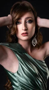 Woman in a green satin gown with full glam makeup, styled by Waring Makeup, Ottawa Special Event Makeup Artist.