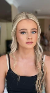 Natural prom makeup with soft waves and fresh, glowing skin, styled by Waring Makeup, Ottawa Prom Makeup Artist.