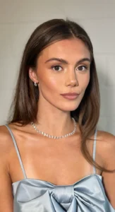 Woman in blue satin top with soft glam makeup, styled by Waring Makeup, Ottawa Lifestyle Makeup Artist.